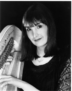 Carol Robbins with harp.