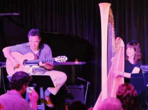 photo of Larry Koonse playing guitar on stage with Carol Robbins playing harp Upstairs at Vitello's in 012