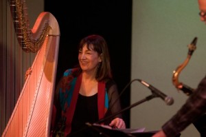 Carol Robbins with harp on stage at Alvas Showroom, San Pedro CA November 23, 2013.