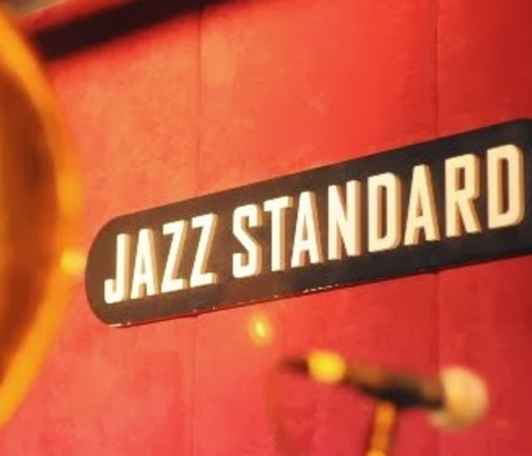 photo montage of red stage trumpet horn microphone and sign Jazz Standard